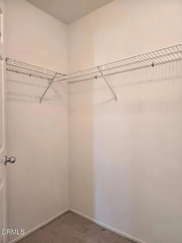 PRIMARY BEDROOM WALK IN CLOSET