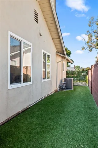 Gated dog run with pet turf
