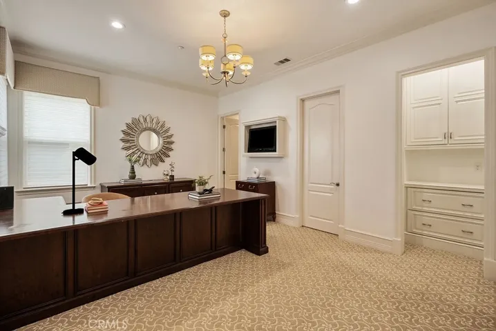Downstairs home office has its own bath (can convert to bedroom)