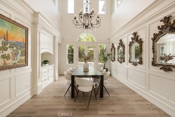 Dining room with high ceiling