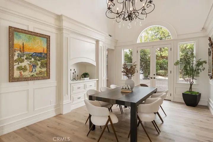 Dining room with high ceiling