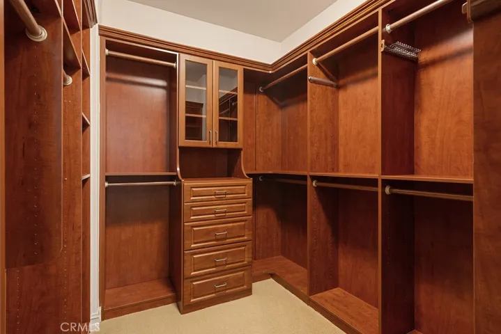 Master has 2 closets (his and hers closet with custom built ins)