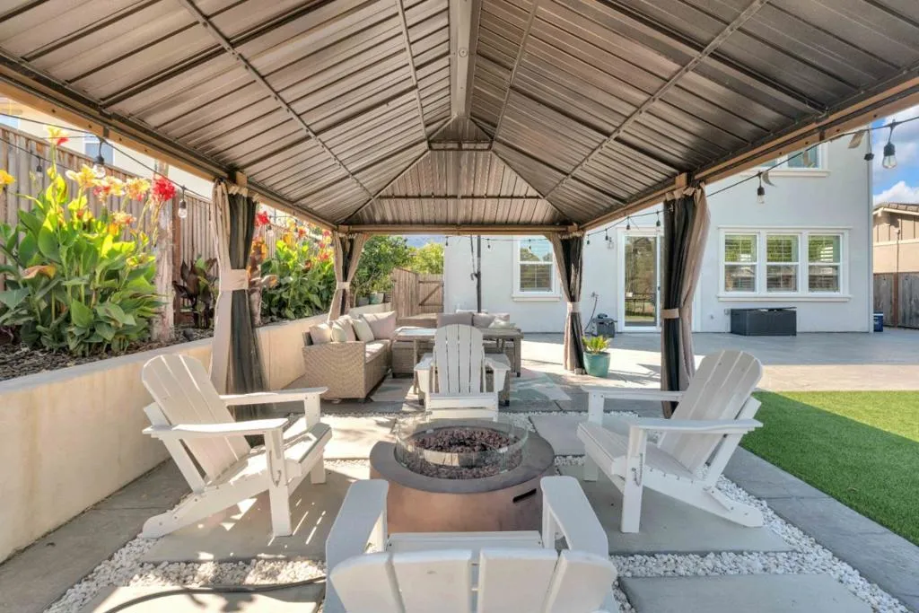 Covered Fire pit seating area and Dining Area