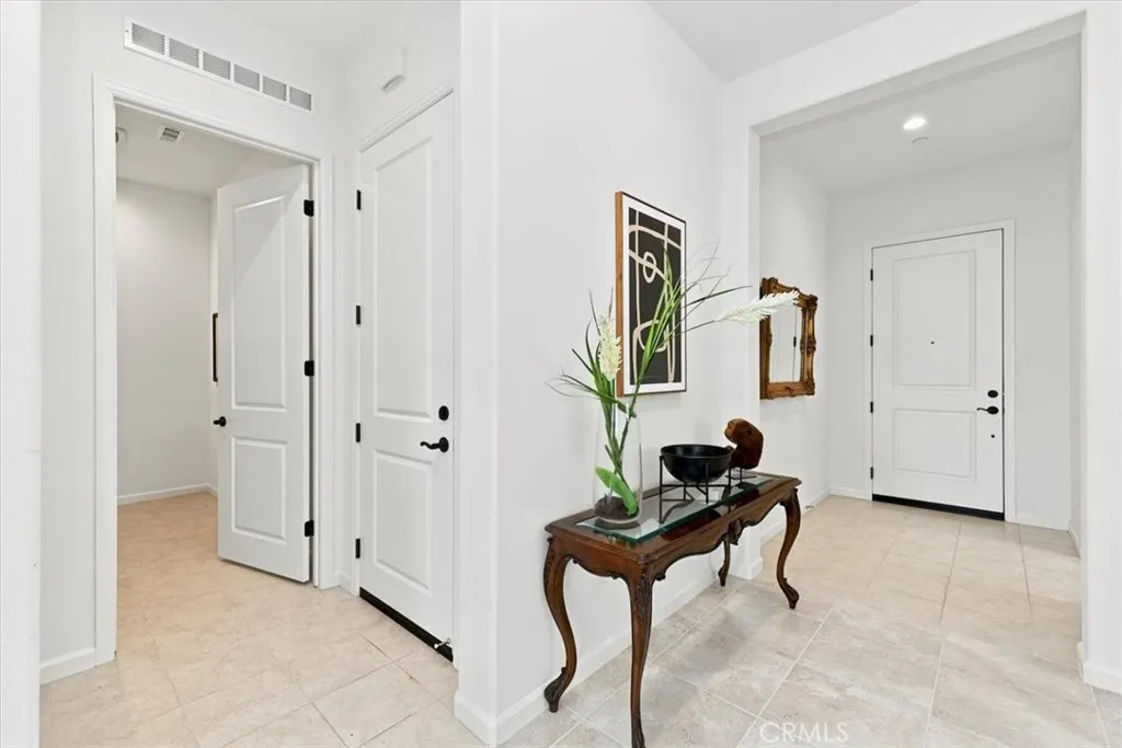 Direct Garage Access & Laundry Room.