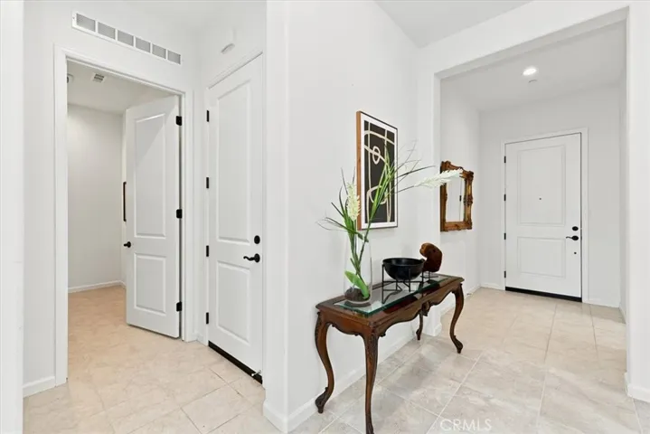 Direct Garage Access & Laundry Room.