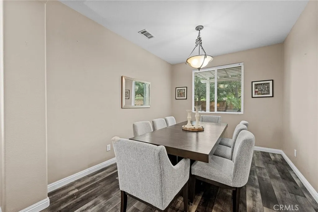 Formal dining room ideal for hosting.