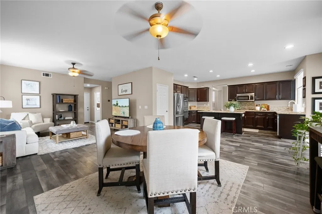 The connected living space offers a natural extension for relaxing or hosting, making this the true heart of the home.