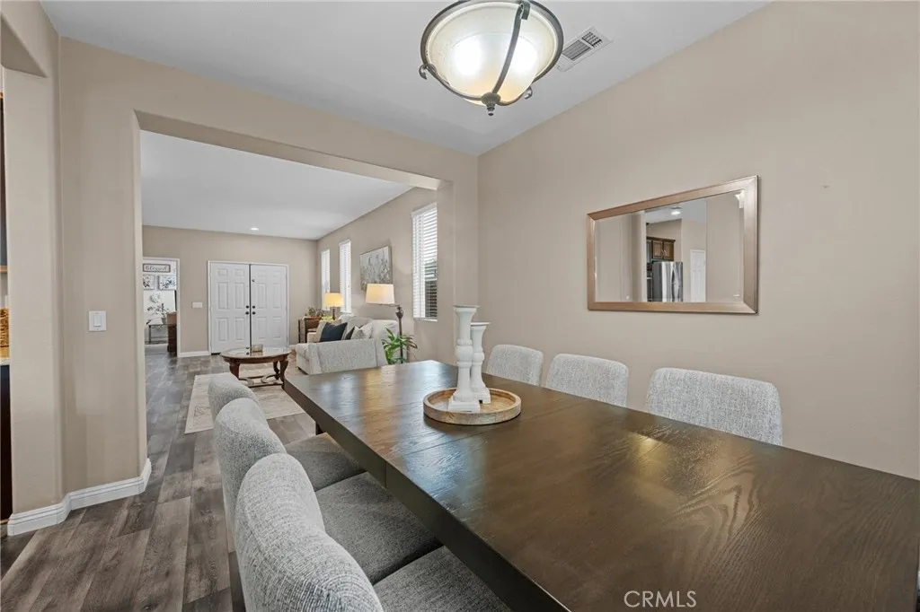 Dining room offering a direct view into the main formal living room.
