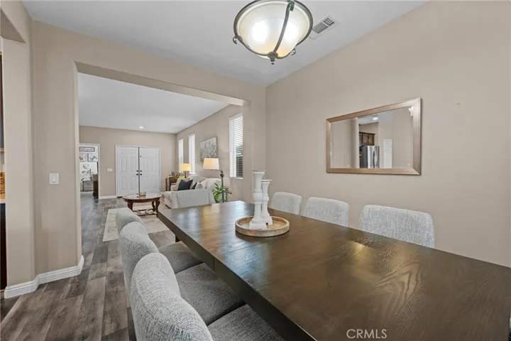 Dining room offering a direct view into the main formal living room.
