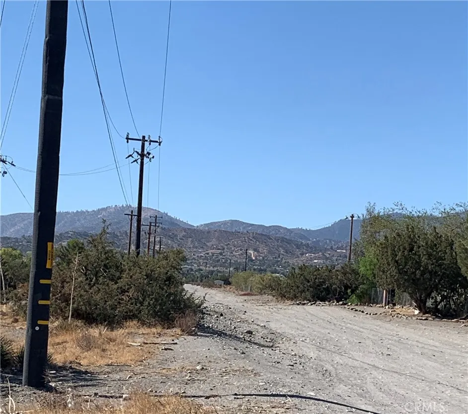 Beautifully Built Homes on Yucca Terrace Within View From Vacant Land

