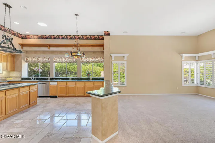 Kitchen Adjoins Family Room
