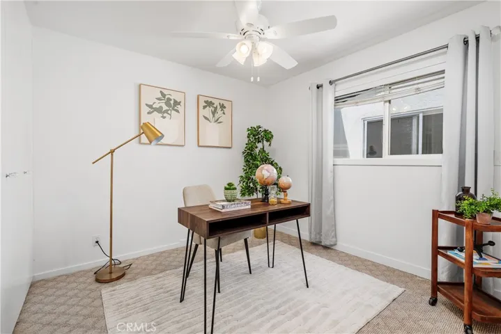 First bedroom staged as optional home office