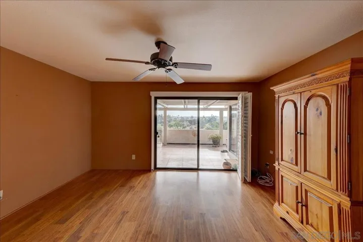 Has a sliding glass door to the back patio.