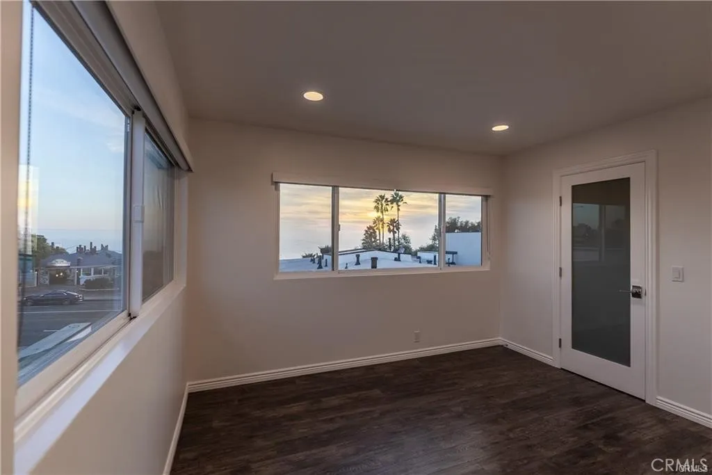 Views from bedroom and opaque walk in closet door