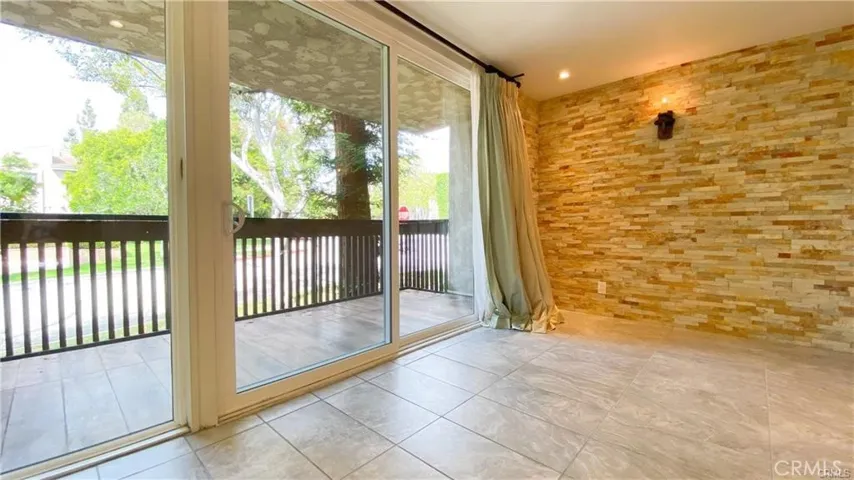 Living Room with Natural light & sliders to Balcony