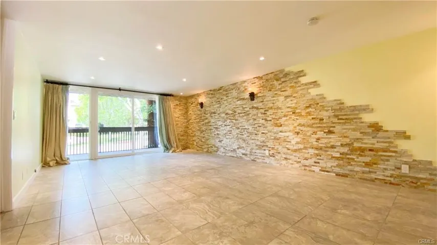 Living Room with Natural light & sliders to Balcony