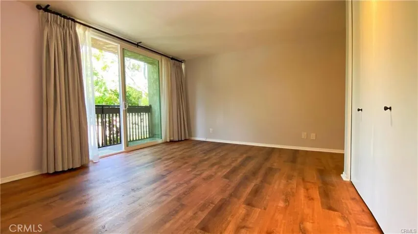 Primary Bedroom w/Large closets and w/sliders to Balcony