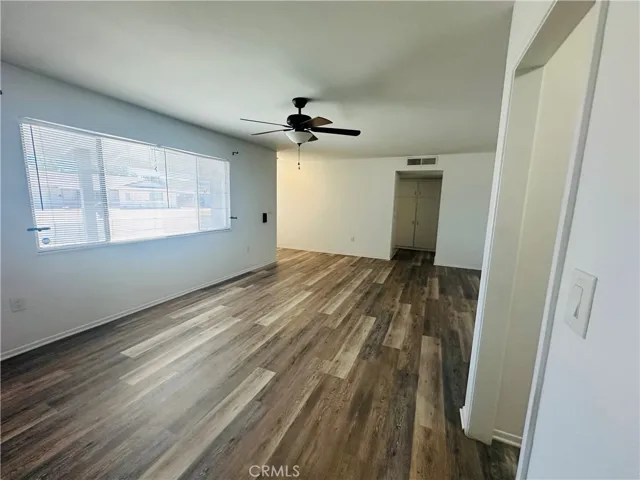 Living room. Floor actually has a bit more of a gray tone. Pictures show different.