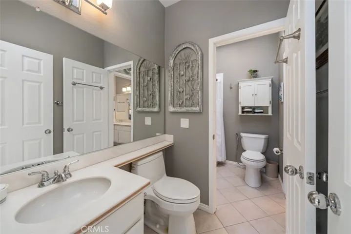Guest Bathroom with connecting door for shared shower/bath.