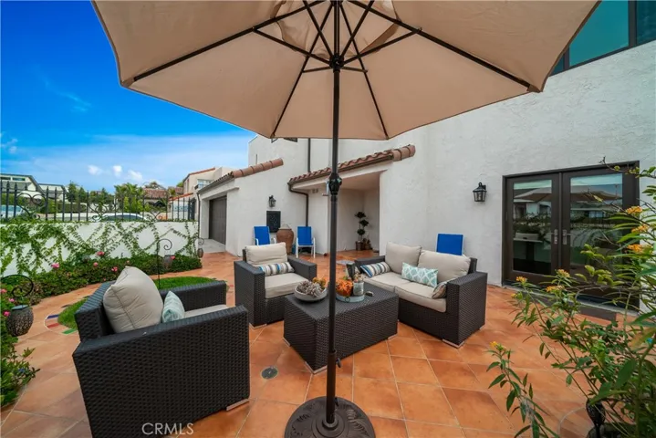 sun drenched! Great, private front yard/entertaining area