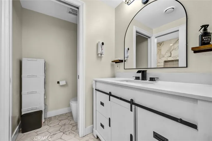 Primary bathroom view 1