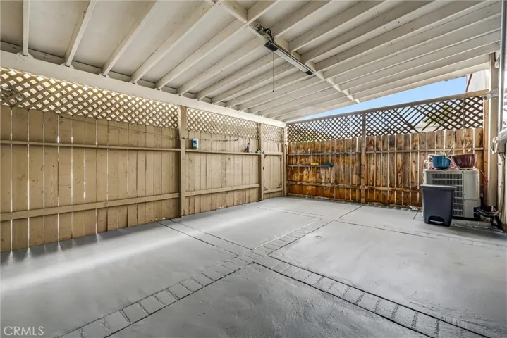 Backyard patio opens directly to your 2 car assigned carport