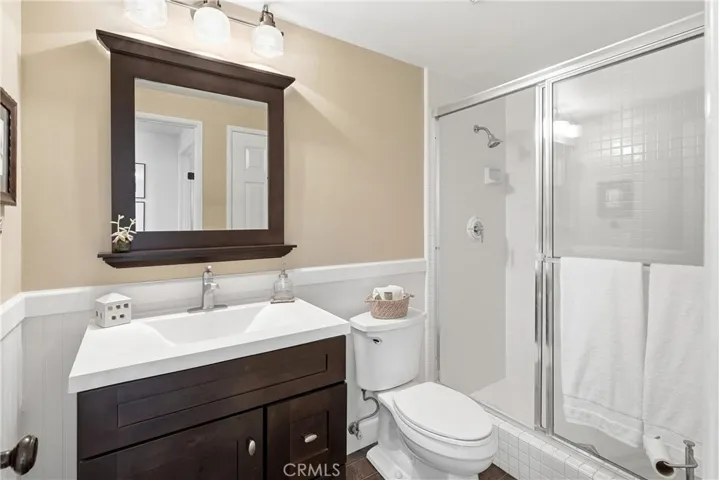 Downstairs bathroom features a step-in shower