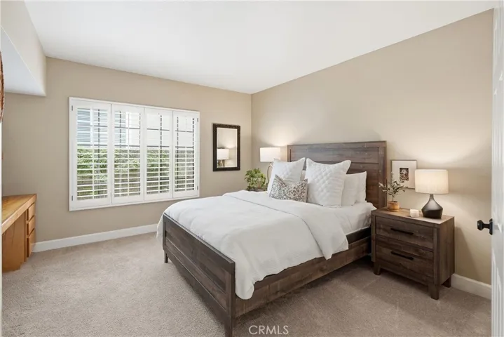The main floor bedroom is perfect as a guest room, home office, or home for older family members who need to avoid stairs