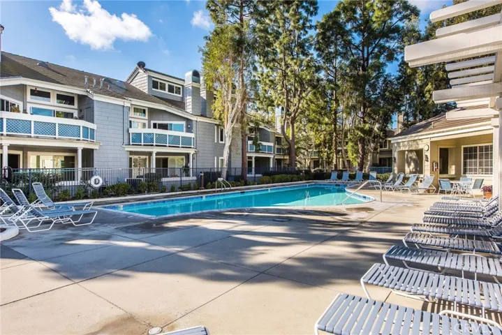 Sparkling community pool with expansive lounge areas.