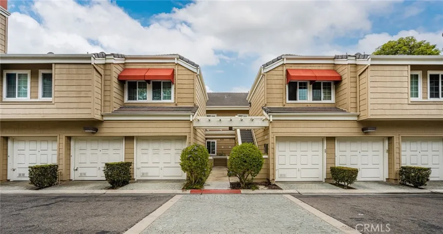 Charming exterior with garage and private entry.