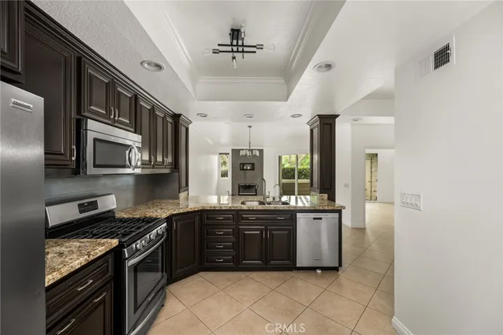 Well-appointed kitchen with generous workspace and storage.