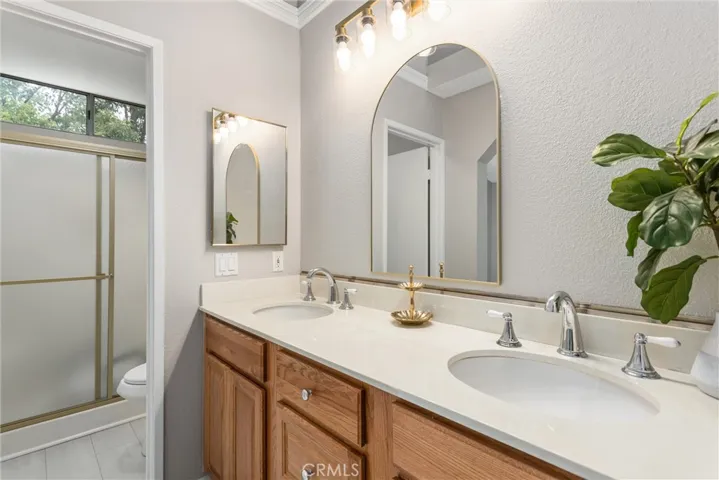 Vanity to shower and toilet room