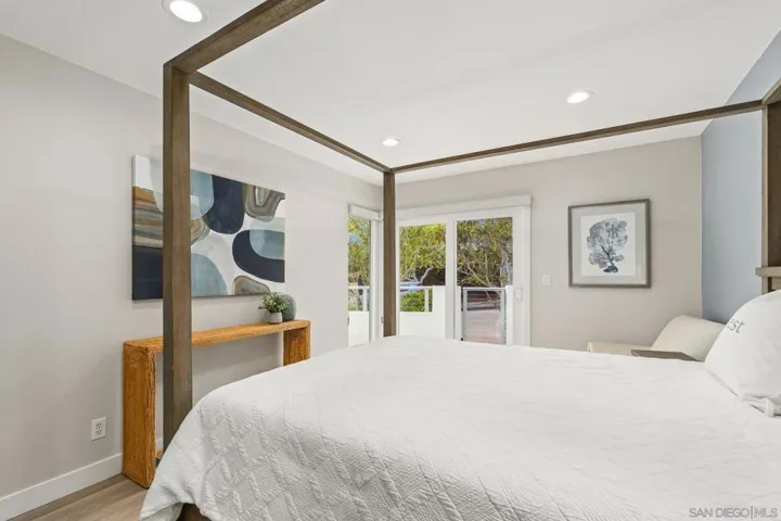 Secondary bedroom with private patio.