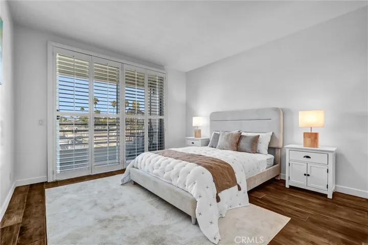 Primary Bedroom #2 with Balcony offering Marina Water Views