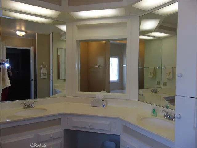 dual sinks and vanity in master bath