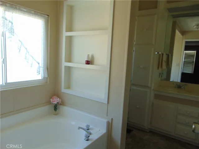 master bath tub, has separate shower in bathroom
