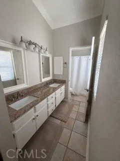 Primary en-suite bathroom with double sinks