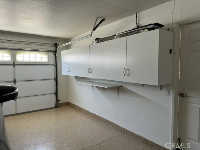Garage Cabinetry, Epoxy Garage Flooring
Direct access from Garage into home