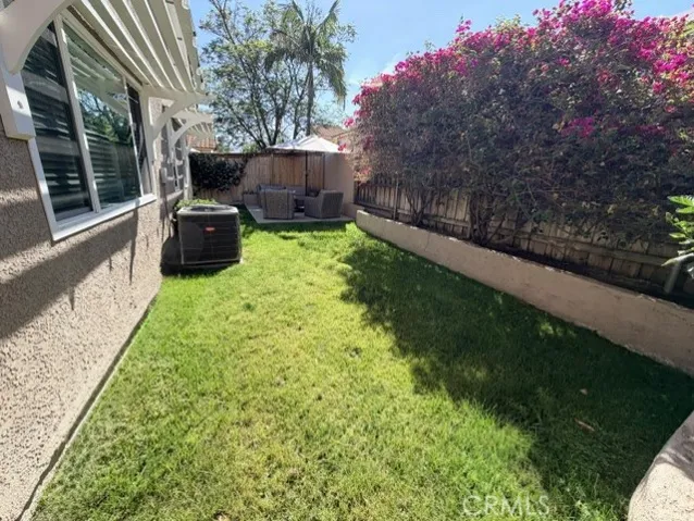 Large grass area in backyard
