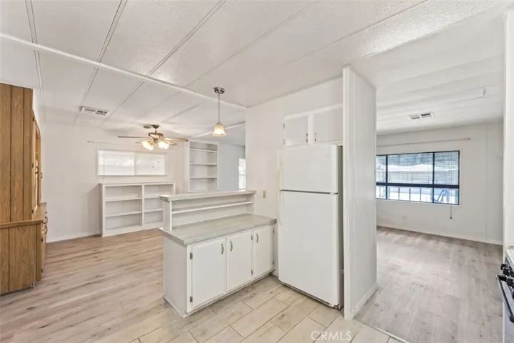 Kitchen Opens to Dining Area and Living Space