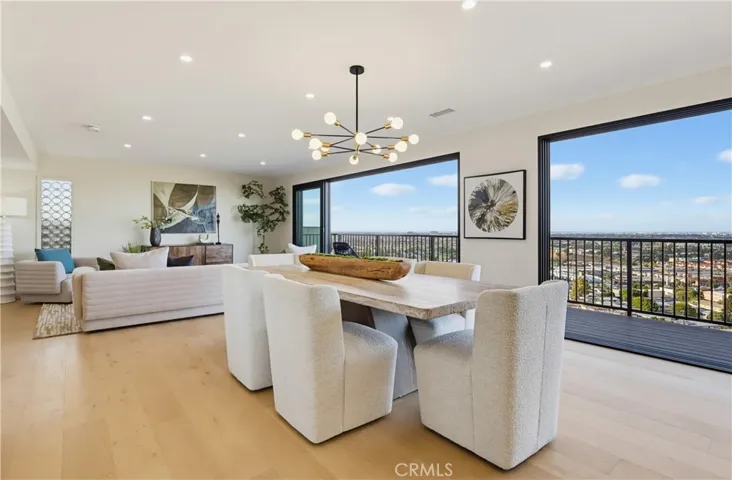 Dining room with balcony and view