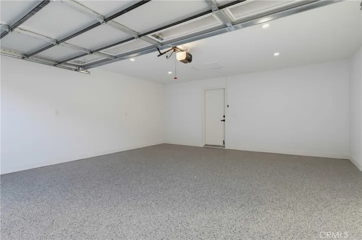 Finished 2 car garage with direct access to the butlers pantry.