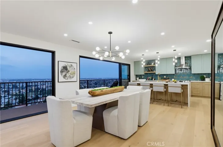Dining room with balcony and view
