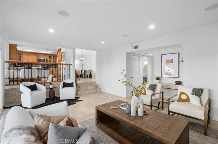 family room with recessed lighting and surround sound speakers