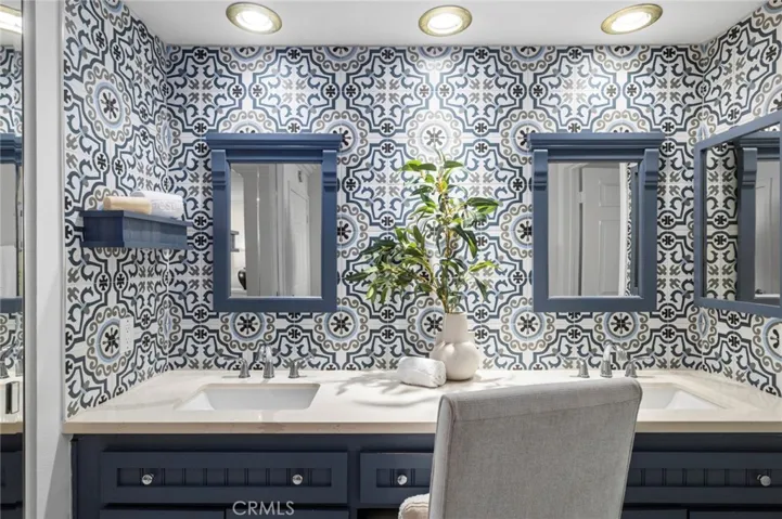 Upgraded primary tile, counters, lights and mirrors