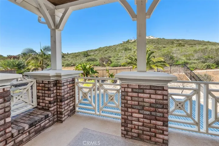 Balcony area from primary bedroom offering views and privacy.
