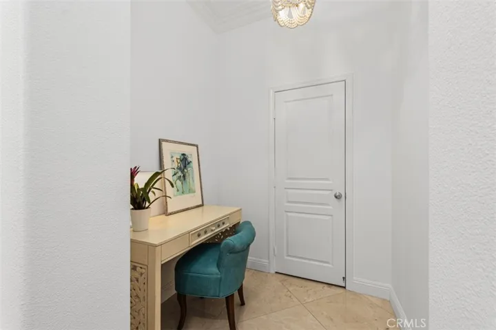 Niche area currently used as office.