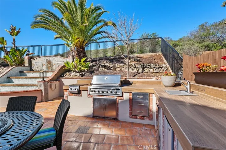 Built in BBQ, Sink, refrigerator.