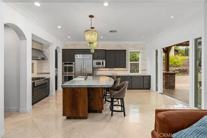 Updated kitchen with new center island & Quartz countertop.