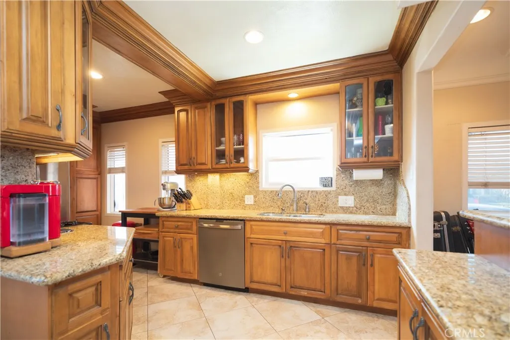 The kitchen offers an abundance of Maple cabinets that provide massive storage.